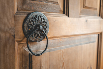 old historical wooden door and metal knocker