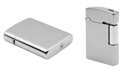 Two metallic, rectangular objects, one lying down and the other standing, with a sleek, reflective surface. Isolated on black