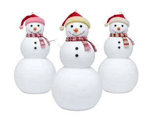 Three cheerful snowmen wear festive hats and scarves