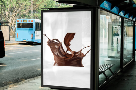 A studio photograph of melted Malik chocolate cascading in a dynamic splash  - 9