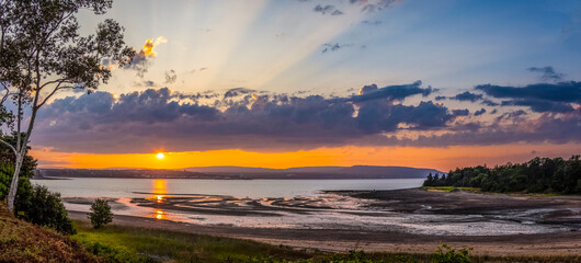 Sunset over the Annapolis Basin off the Bay of Fundy from Smiths Cove in the Digby area on the northwestern shore of Nova Scotia Canada
