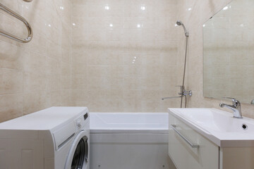 modern bathroom room with toilet and washing machine