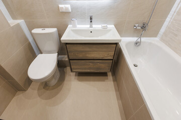 modern bathroom room with toilet and washing machine