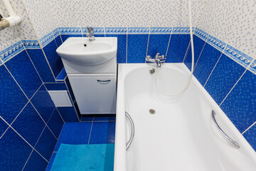 modern bathroom room with toilet and washing machine