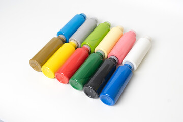 Colorful Acrylic Paint Bottles Isolated on a white background