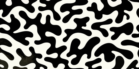 Abstract black and white organic shapes create a seamless flowing pattern