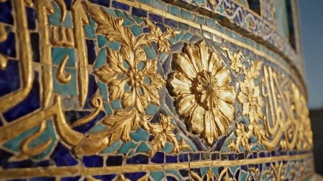 Cinematic close up of golden calligraphy and floral mosaic tiles on dome of ancient islamic mosque
