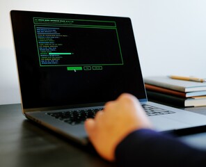 Middle Aged Systems Administrator Engineer Restoring Backups After Ransomware Hacking Attempt - Cybersecurity and Data Protection Concept