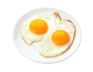 Overhead shot of two sunny-side-up eggs on a white plate, set against a black background