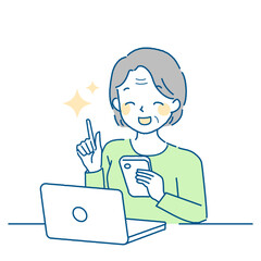 パソコンやスマートフォンの問題を解決するお年寄り女性