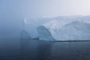 Atmospheric Mist Over Giant Ice Floes in a Cold Arctic Sea © Michel