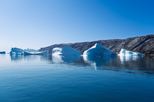 The Delta of Frozen Water: Spectacular Ice Formations in Disko Bay - Powered by Adobe