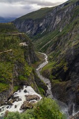 Obraz premium view of the Mabodalen Valley and the top of the Voringsfossen Waterfall near Fossli in Vestland County