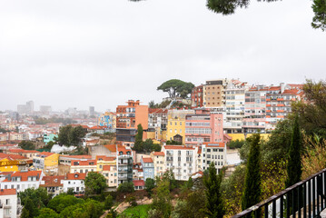 Colorful hillside view over historic Lisbon rooftops