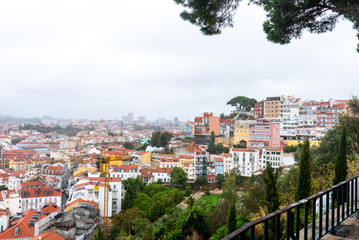 Colorful hillside view over historic Lisbon rooftops
