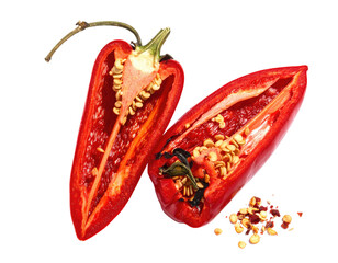 A vibrant, halved red chili pepper with seeds and flecks, isolated against a solid black backdrop