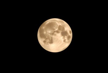 Fototapeta premium A view of a Full Moon in the night sky