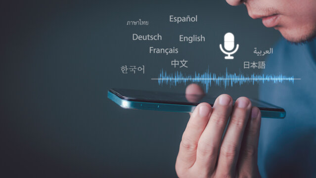 Real-time AI voice translation technology, global communication, and voice assistants for business: A man is speaking into a smartphone, with sound waveforms and multilingual icons displayed.
