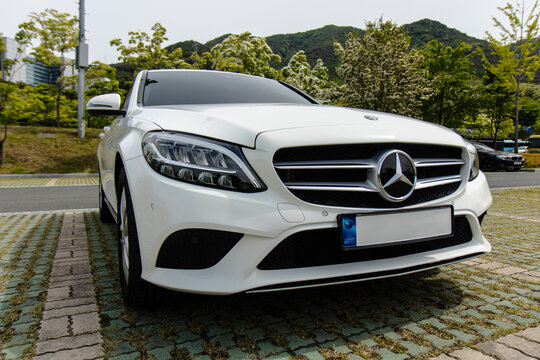 May 6, 2021, Seoul, South Korea - White Mercedes-Benz C200 car parked outdoors