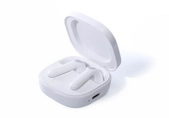 White wireless earbuds with charging case isolated on white background