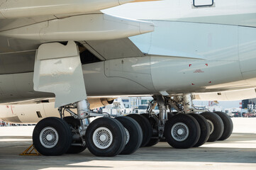 Close up of the main landing gear wheels on a wide-body aircraft