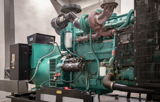 Detail of Engine generator set powered by Diesel power in Electricity generation room.