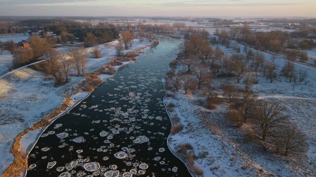 Warta River Flow in Winter Landscape with Ice Floes Aerial
