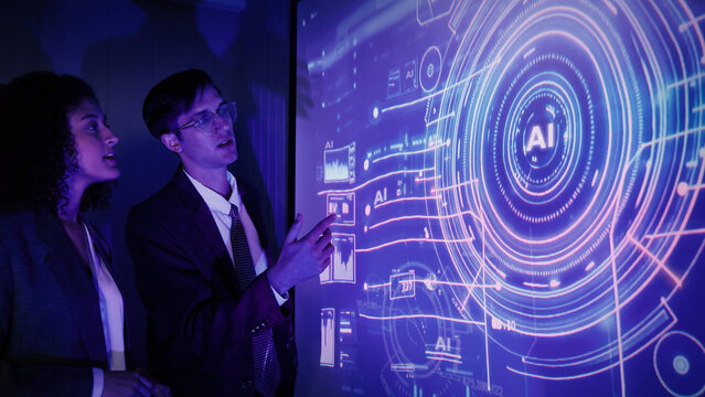 Ai using. Business team discussing and using artificial intelligence technology or Ai assistant. Futuristic innovation AI technology collaboration and ideas for future. Business Tech Startup meeting. - Powered by Adobe