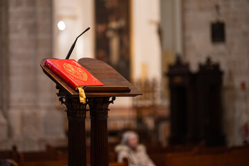 Holy Scripture Bible on the lectern in  cathedral la Seu in VALENCIA, SPAIN