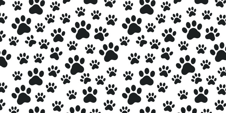 Charming seamless pattern of various black animal paw prints scattered playfully across a clean white background, perfect for pet-themed designs