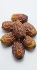 Obraz premium Pile of Fresh Dates on White Background Healthy Food Stock Photo