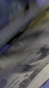 Financial Success and Banking Concept: Electronic Money Counter with USD Bills
