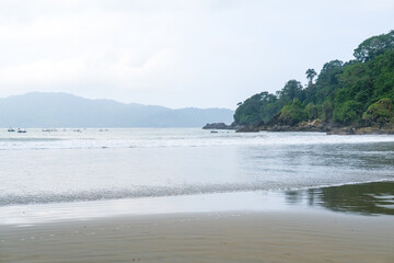 Rajegwesi Beach in Meru Betiri National Park showcases a stunning meeting of dense tropical...