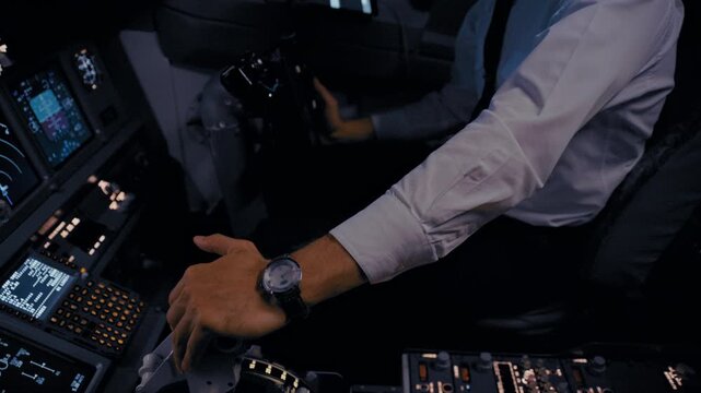 Airline Captain Operating Modern Passenger Jet Controls