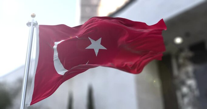 Vibrant Turkey National Flag with Red Crescent and Star Shining in Daylight. Close-up of the Turkish flag (Ay Yıldız). The bright red fabric and white crescent moon and star are captured 