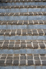 Concrete stairs that have a cube tread are made with a mixture of concrete cube and mortar.