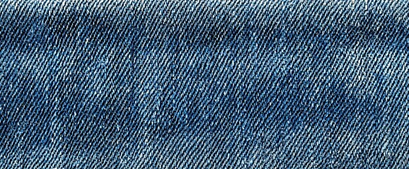 デニム生地のクローズアップで質感やパターンの詳細を表示します