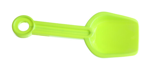 Light green plastic shovel isolated on white. Children's beach toy