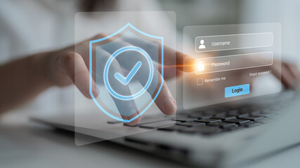 A user engages with a secure login interface on a laptop, highlighting the importance of cybersecurity and protection of personal information in a digital environment. Gantry