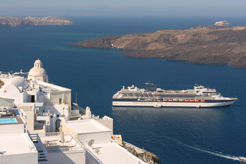 Naklejka premium White cliffside buildings and churches in Fira, Santorini, Greece