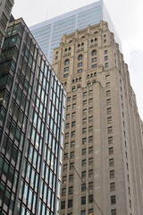 Naklejka premium modern office buildings including heritage Bank of Commerce (Imperial Bank of Commerce headquarters) designed by Pearson and Darling (with York and Sawyer), 1931, 25 King W, Toronto