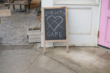 Naklejka premium chalkboard sign outside The Loveless Cafe & Bar at 1430 Dundas St W in Toronto (near Gladstone Av)