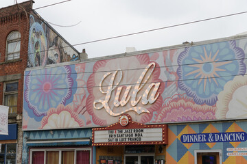 Naklejka premium exterior building facade and sign of Lula Lounge located at 1585 Dundas St W, Toronto