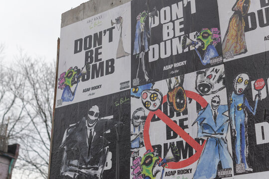 street posters on a hoarding in Toronto at Perth Av south of Bloor St W &ldquo;Don&rsquo;t Be Dumb" title of **A$AP Rocky&rsquo;s upcoming fourth studio LP