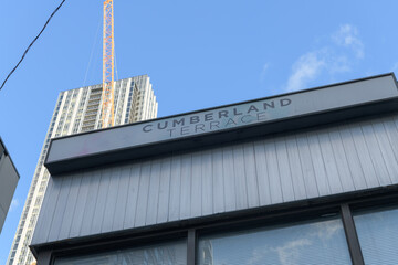 Naklejka premium sign outside Cumberland Terrace (Bay St entrance), Toronto