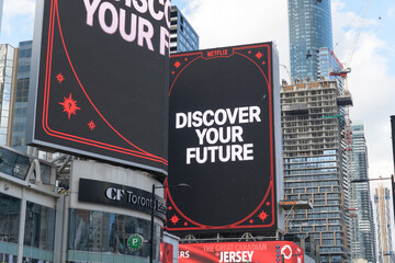 Naklejka premium Netflix digital advertising at Sankofa Square, Toronto (Discover your future)