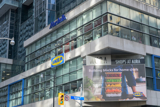 exterior building facade and signs including IKEA Toronto Downtown at Aura Concourse Shopping Mall, 382 Yonge St