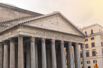 Fototapeta premium pantheon rome italy ancient architecture stone exterior historic temple building with columns in italian city street at sunset concept of travel, tourism, architecture