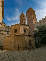 Medieval houses in Albenga, characterized by narrow alleys called carrugi, and arches, support bridges between the houses in the historic center, in the province of Savona, Liguria.