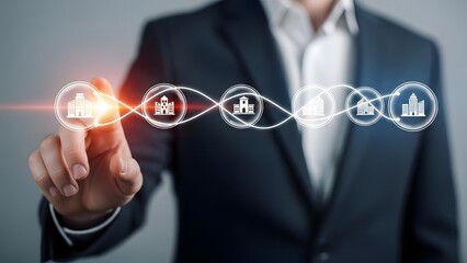 Businessman interacting with glowing digital interface icons